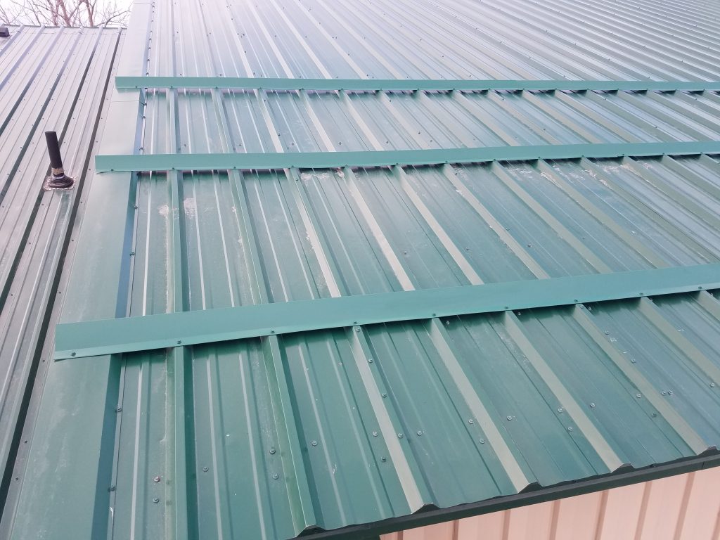 Closeup of green metal roof