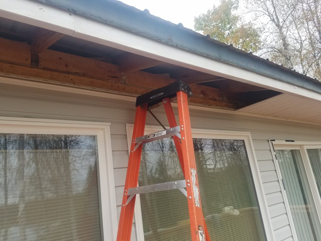 Ladder underneath roof overlap